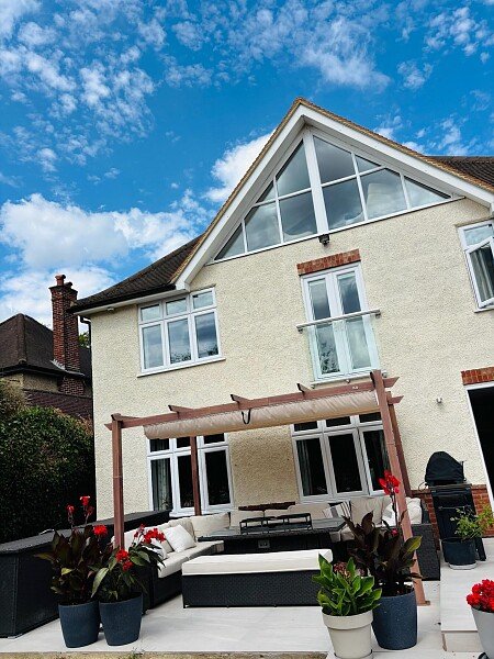 Rear house patio left dining area