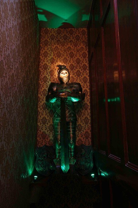 suit of armour over the stairs