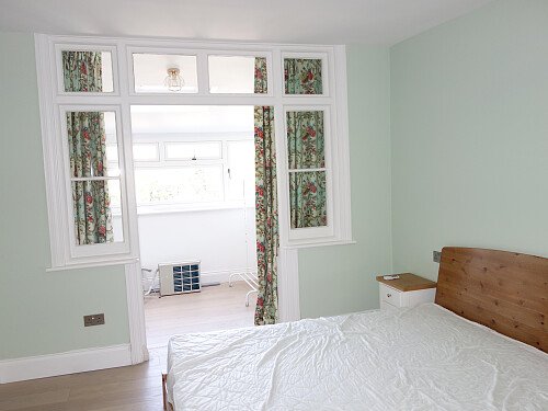 Bedroom with enclosed balcony 1