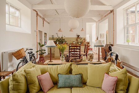 Kitchen island, copper pipework, rectory table, vaulted ceilings, rustic framhouse, open plan living, bicycle