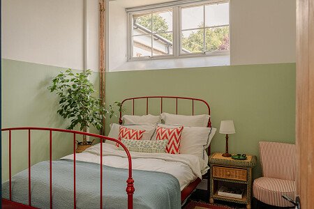 Red bed, green bedroom