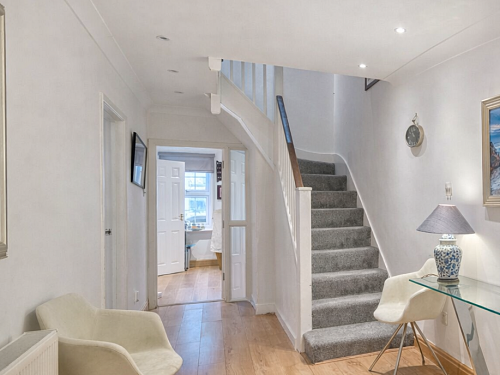 Modern hallway with seascape and lamp