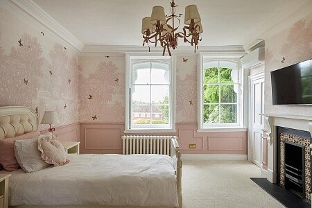 pink bedroom facing garden