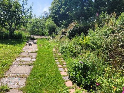 garden to side of main property